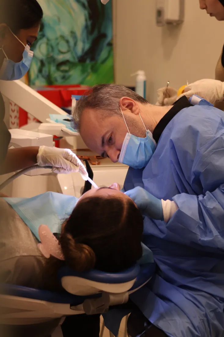 Careful, close-up work at the dental chair