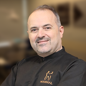 Dr. Manhal - Dental Implant Specialist